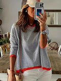 Genimah | Gestreept Sweatshirt met Oranje Details